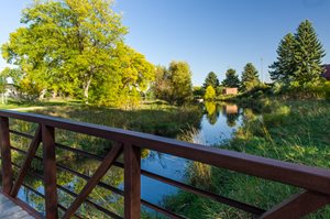 A bridge over a creek in Fort Collins