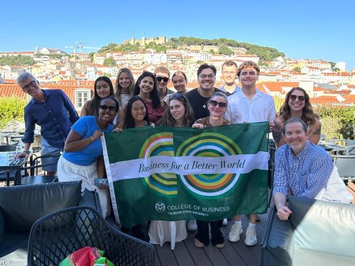 Students and faculty pose for a photo in Lisbon, Portugal.