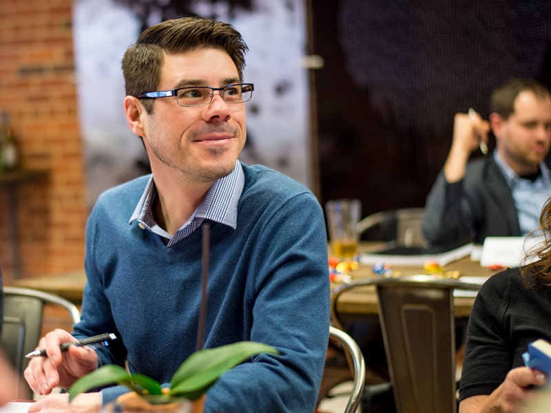 An Evening MBA student listens to a lecture.