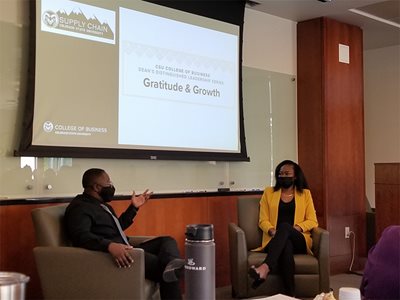 Patrice Palmer and Angelina Howard sit and discuss during the "Gratitude and Growth" event