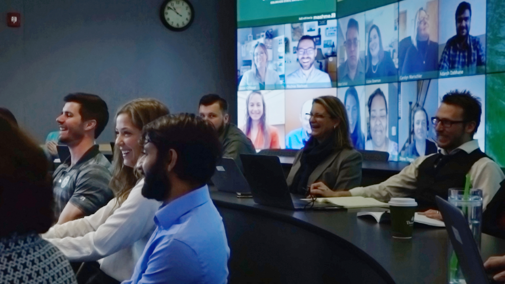 Mosaic screen seen behind in class students
