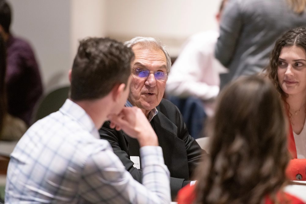 Sonny Lubick converses with College of Business students