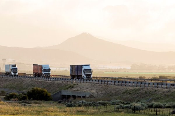 MBA students and College of Business Staff pose for a picture at the UCLA Training Center in Los Angeles.