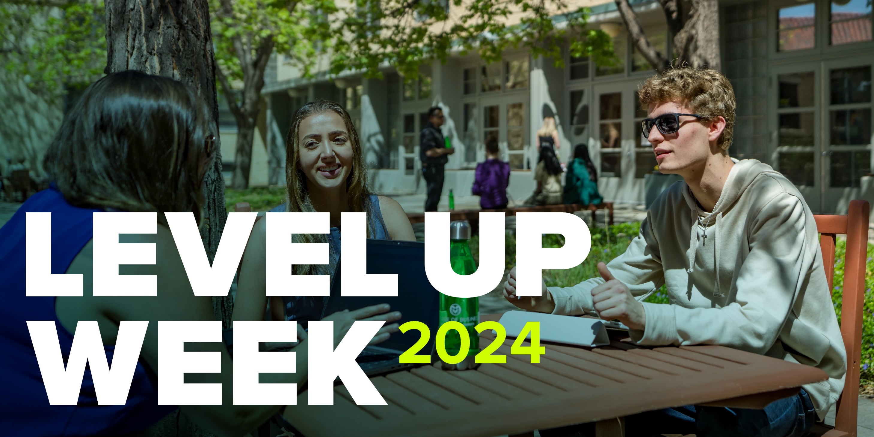 Students sitting in a courtyard