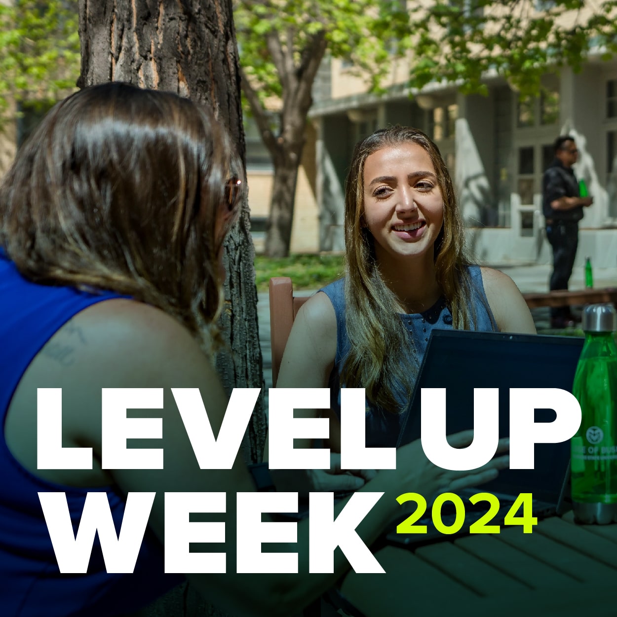Students sitting in a courtyard